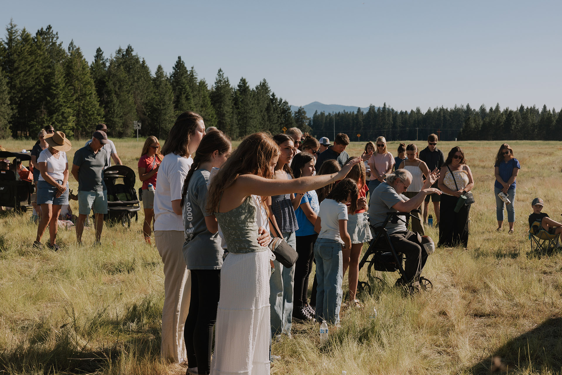 Community praying over property